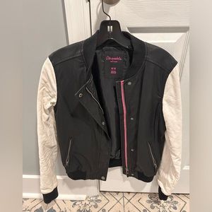 Black and white jacket with hot pink accents